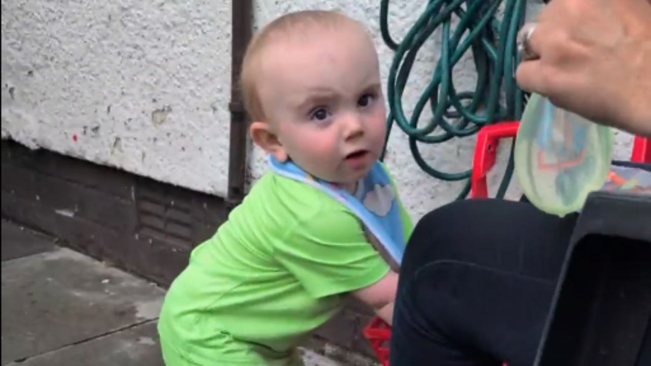 Summer fun goes wrong: Kid gets soaked by his own water balloon