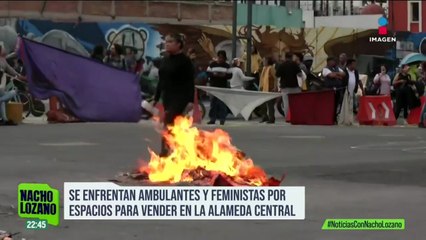 Trifulca entre comerciantes y feministas en la Alameda Central; peleaban puestos ambulantes