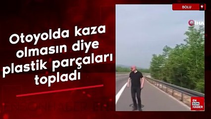 Bolu'da otoyolda kaza olmasın diye plastik parçaları topladı
