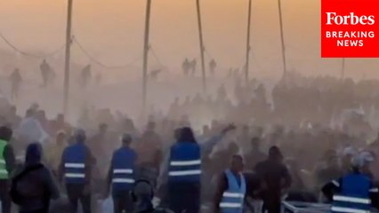 Gaza Residents Rush To Aid Distribution Site In Rafah