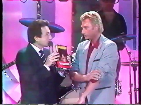 Johnny Hallyday – Interview Champs-Élysées (06 Décembre 1986, Antenne 2) – Sortie du Livre de Long Chris