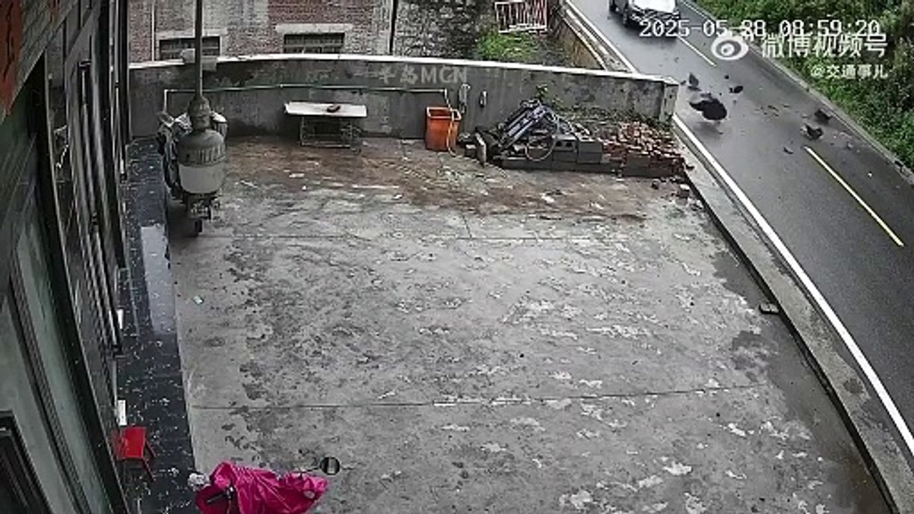 Rock landslide hits car on mountain road