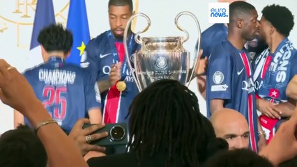 Macron welcomes PSG team to presidential palace to celebrate their historic Champions League win