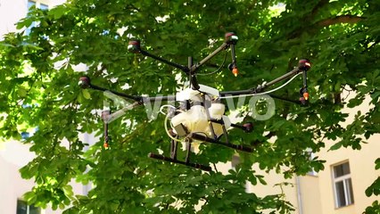 Drone Watering plants in Europe - Steady Tracking Shot