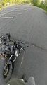 Biker Lifts Front But Falls And Oil Spills