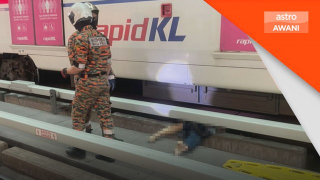 Lelaki Taiwan terjatuh di landasan sebelum digilis tren