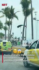 Durante un evento aéreo en Puerto Vallarta, un paracaidista militar fue desviado por el viento y aterrizó en una zona no prevista, provocando la caída de un poste de alumbrado.