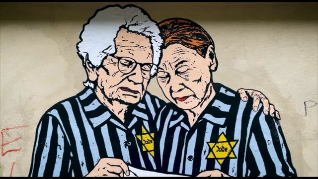 Al Memoriale dello Shoah spunta murales con Segre e Bruck abbracciate