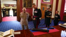 King Charles fires artillery gun during regiment visit
