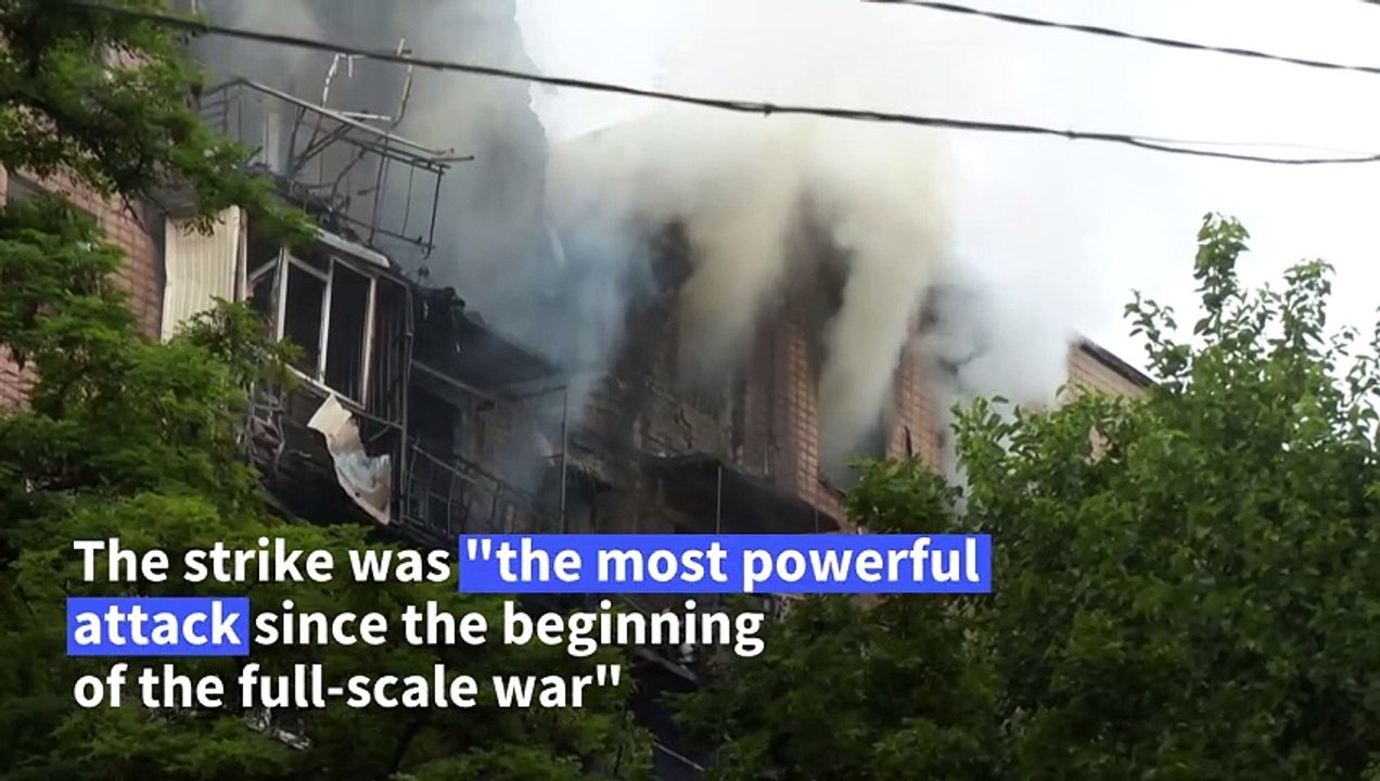 Firefighters tackle smouldering building after Kharkiv strike
