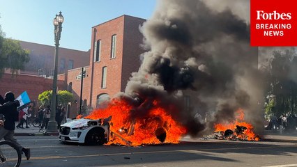 SHOCKING FOOTAGE: Self-Driving Waymo Cars Set On Fire During Anti-ICE Demonstrations In Los Angeles