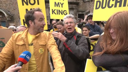 WATCH: Anti-monarchy protester confronted by furious royal fan during King's visit