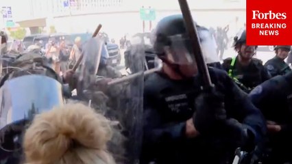 LAPD Officers Use Clubs On Anti-ICE Demonstrators In Los Angeles, CA