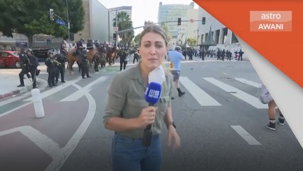 Wartawan Australia terken tembakan peluru getah ketika buat liputan langsung