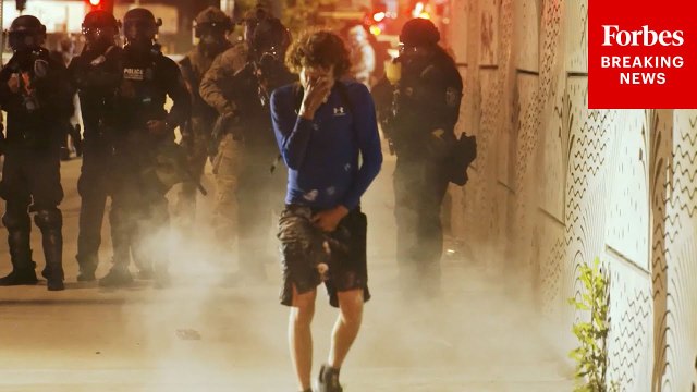 Flash Bangs Set Off Amidst Clashes Between Anti-ICE Demonstrators & Authorities In L.A.