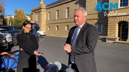 Liberals back embattled premier, election call looms