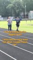 Boy Stays Behind to Encourage Friend Struggling to Finish Race