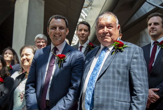 New Elected Davy Russell is welcomed to the Scottish Parliament by Scottish Labour Leader Anas Sarwar and other Labour MSPs