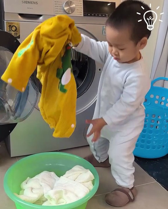 Little one learns laundry magic!.hd