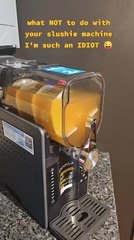 Woman Spills Slushie Mix While Using Machine