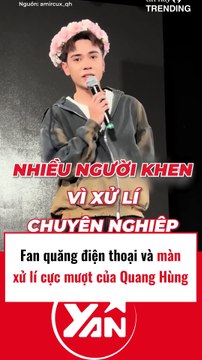 Fan quăng điện thoại lên sân khấu và cách xử lí cực khéo của Quang Hùng