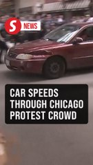 Car speeds through crowd during anti-ICE protest in Chicago