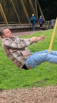 Man Loses Grip on Zipline Swing and Fall on Ground