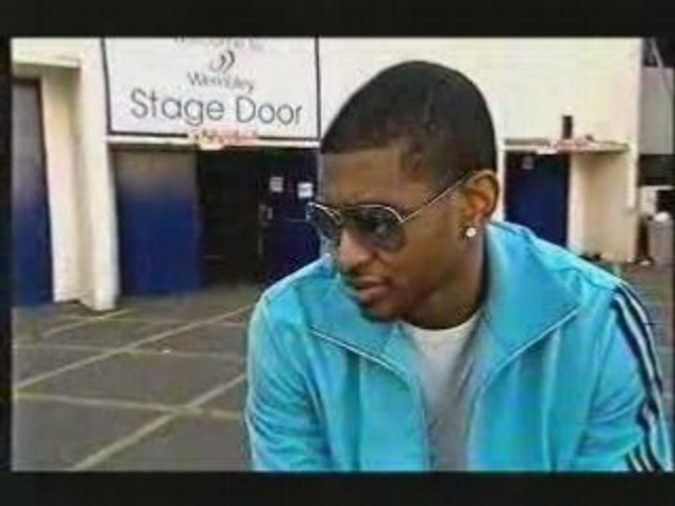 Usher answers questions from fans