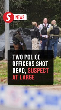 Australian police hunt gunman who shot dead two officers in rural town