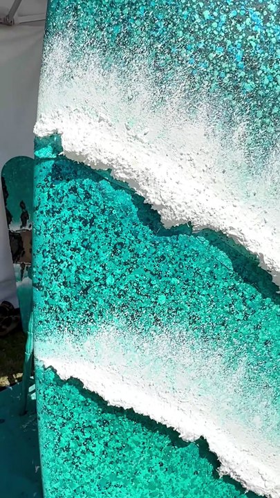 Artist Gemma Lesinger is selling the one-of-a-kind surfboard for Oceana UK