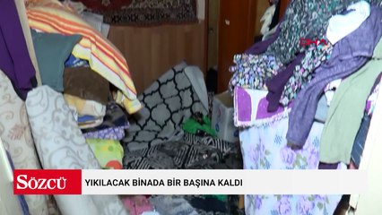 Yıkılacak binada bir başına kaldı