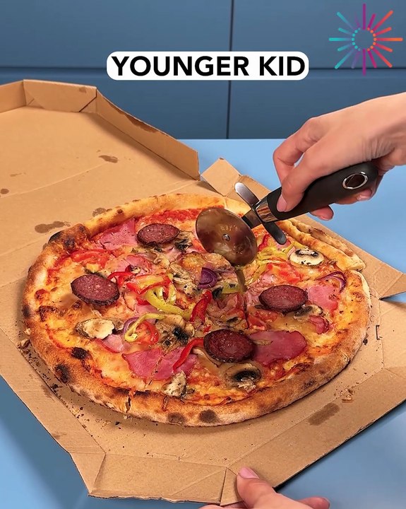 Cutting pizza with extra love 🍕❤️