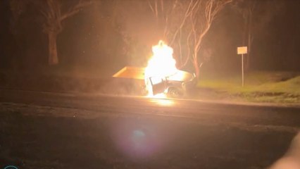Two people seen running from ute before flames erupted