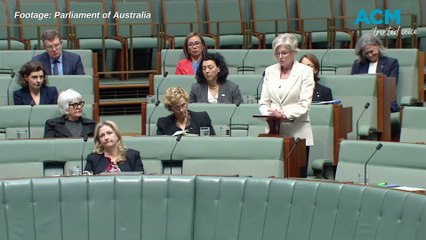 Federal Parliament falls silent in respect for the two police officers shot and killed