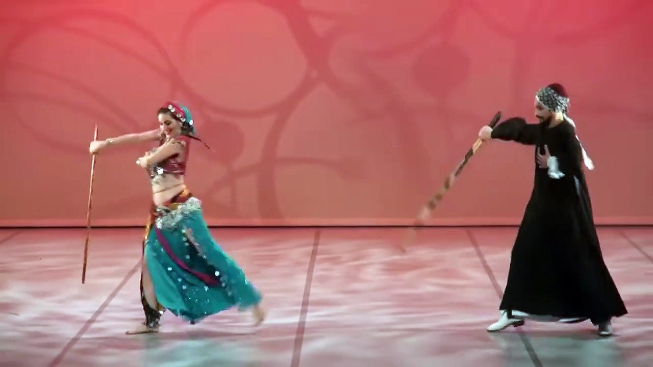 Two Egyptians in Upper Egyptian clothes practicing authentic Egyptian dancing