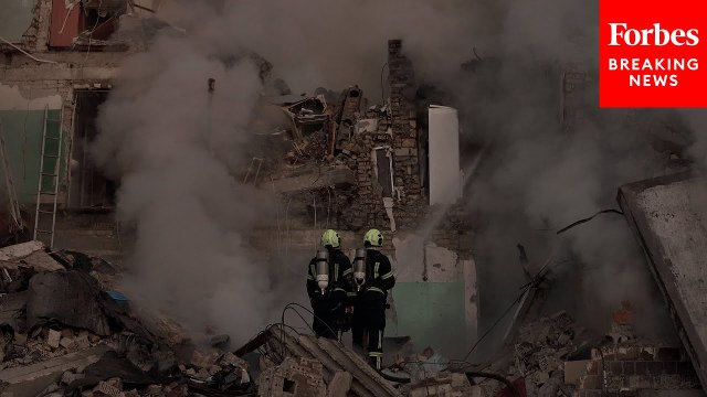 Ukrainian Emergency Crews Respond After Russian Missile And Drone Strikes On Kyiv