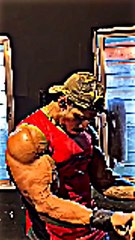 A gym enthusiast is doing an intense workout to strengthen his arm muscles.