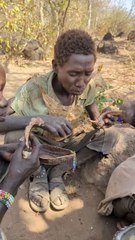 👉 Hadza Hunter Enjoys Fresh Meat From the Fire | Wild Survival Food
