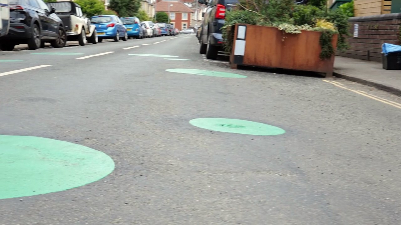 Why mysterious green spots have appeared on a south Bristol road