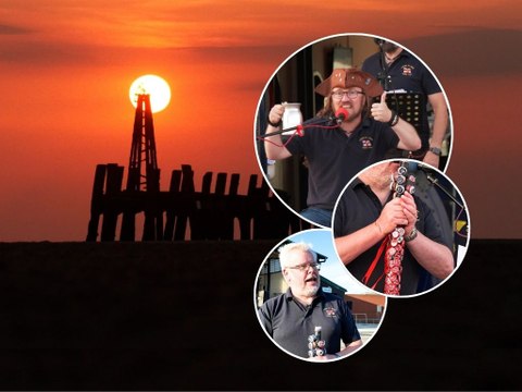 Watch sea shanty crew's boozy sunset sing-along outside RNLI station