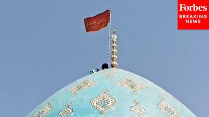 Iran Raises A Red 'Revenge Flag' In Qom After Israeli Airstrikes