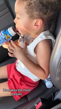 Kid Accidentally Spills Milk on Himself While Using Straw