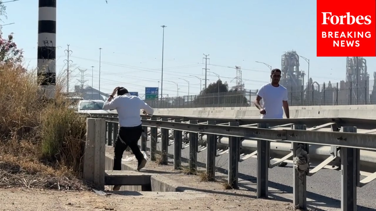 People Seek Cover As Sirens Ring Out Across Israel Amid New Wave Of Iranian Missile Strikes