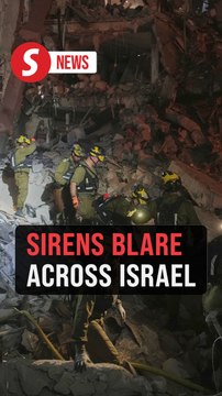 Projectiles seen above central Israel as Iran launches new missile salvo