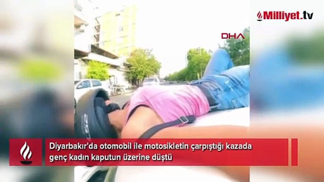 Genç kadın kaputun üzerine düştü! Kaza anı böyle görüntülendi