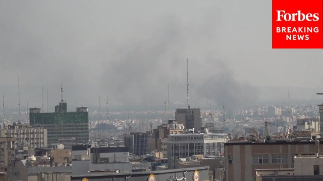 Plumes Of Smoke Rise From Tehran After Israel Targets Iranian Capital With Missiles