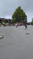 Two Men Collide While Skateboarding and Both Fall Down