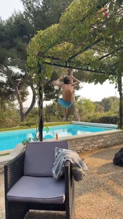Guy Hits Head on Metal Bar While Jumping Into Pool