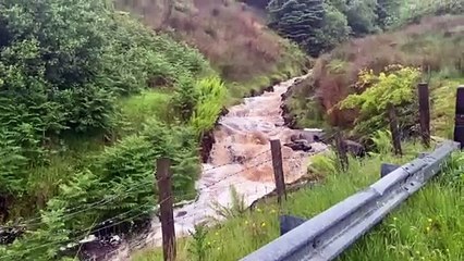 Heavy rain increases speed of water in river above Cushendall
