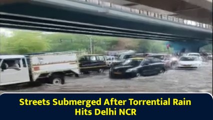 Streets Submerged After Torrential Rain Hits Delhi NCR